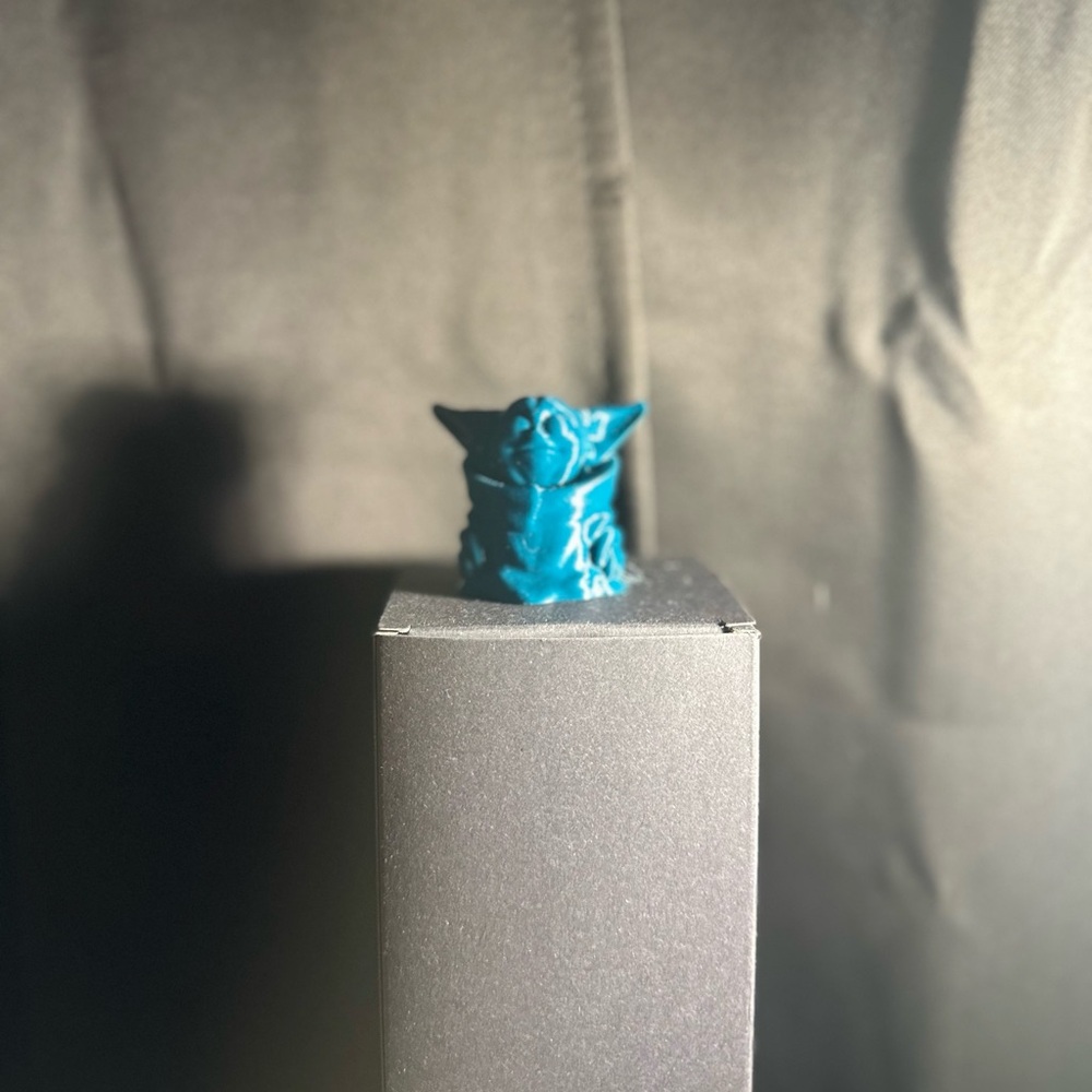 Teal Yoda figurine